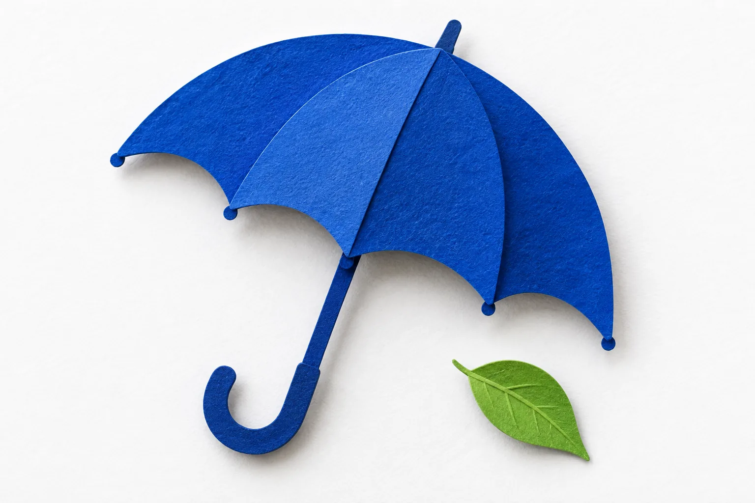 Tactile cobalt paper umbrella with one green leaf